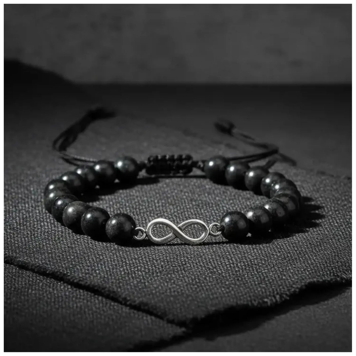 Pulsera Artesanal Piedra Natural Shungita con Dije Infinito de Plata - Bisutería Lola D
